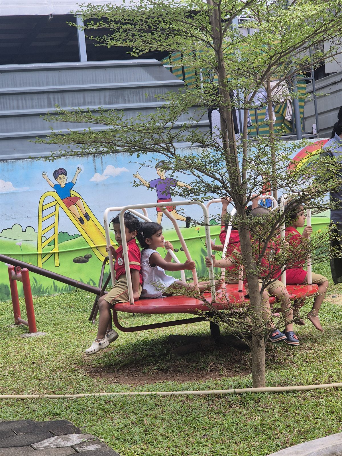 Children enjoying the outdoor play area