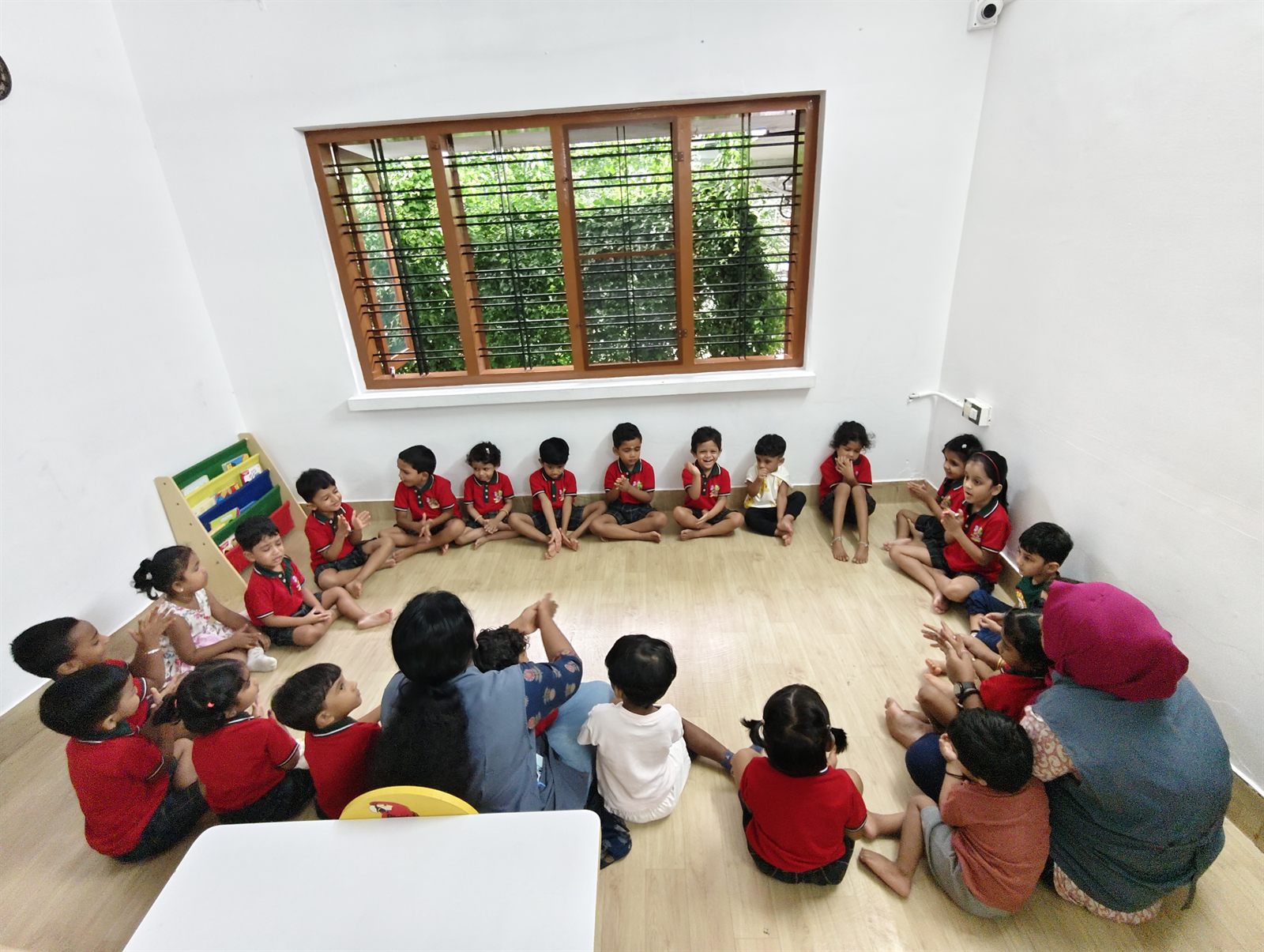Children gathered in a circle for group time
